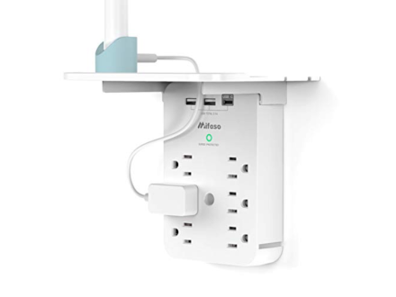 This outlet extender with a shelf cleared my cable clutter, and it's down to $10