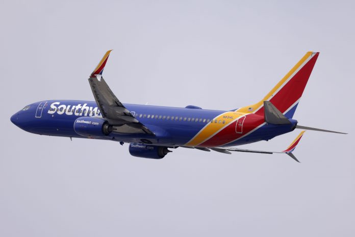 DOT sues Southwest, fines Frontier for 'chronically delayed flights'