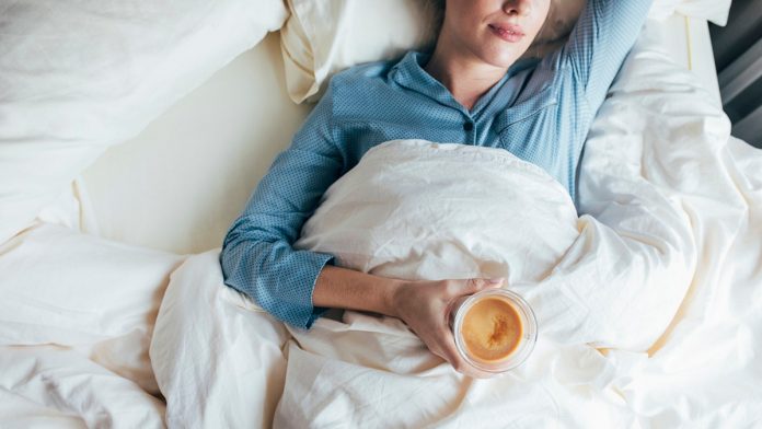 'Hurkle-durkling' is the viral travel trend that involves lying in bed all day