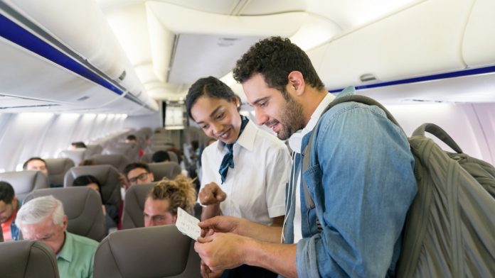 First-class pretenders cheat their way to free drinks by using ‘seat-squatter’ hack