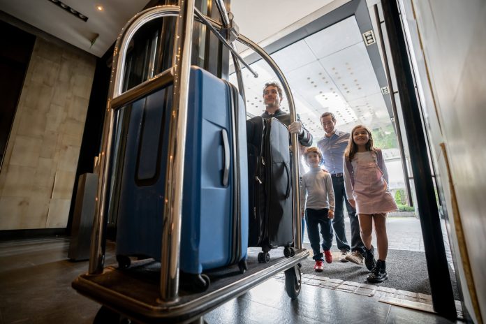 Many business travelers are quietly taking their families along on trips
