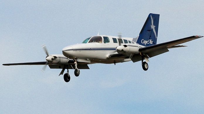 Plane door opens in midair moments after takeoff, leaving flight passengers stunned and social media buzzing